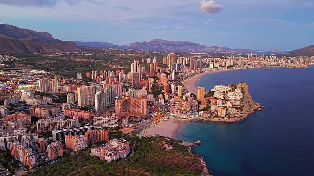 istock Peaceful Seaside Cityscape At Sunset, Elegant Coastal Setting With Glowing Lights And Tranquil Waters 2252905788