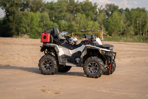istock Exploring the sandy beach on an ATV during a calm afternoon 2252907530