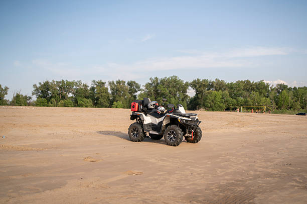 People driving quad bikes during safari trip in Arabian desert not far from Hurghada city, Egypt