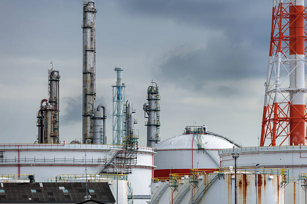 istock Industrial Oil Refinery Complex With Tall Towers and Storage Tanks Under Cloudy Sky 2252908335