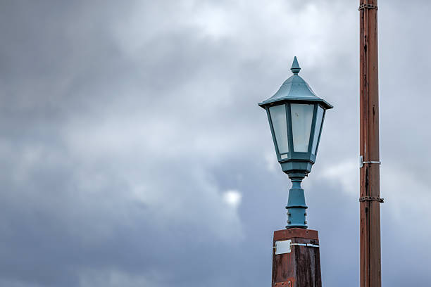 istock Vintage Lamp Against Cloudy Sky 2252908345