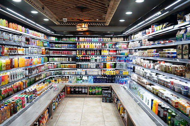 istock Interior of a modern convenience store with rows of refrigerated drinks 2252910531