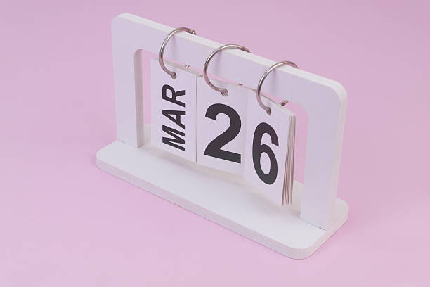 istock March 26 on calendar on pink background 2252911057
