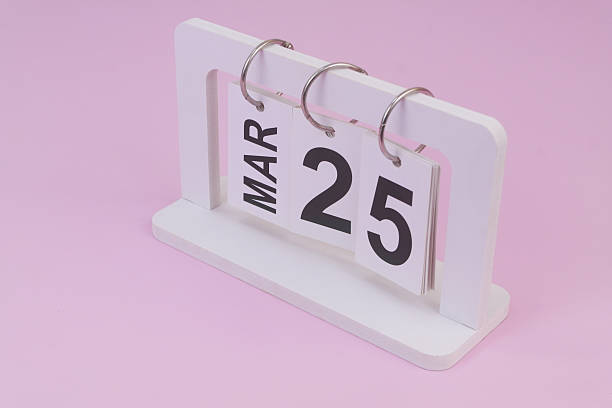 istock March 20 on calendar on pink background 2252911070