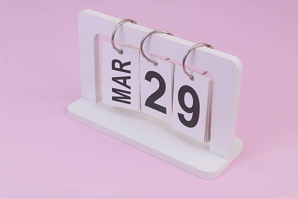 istock March 29 on calendar on pink background 2252911072