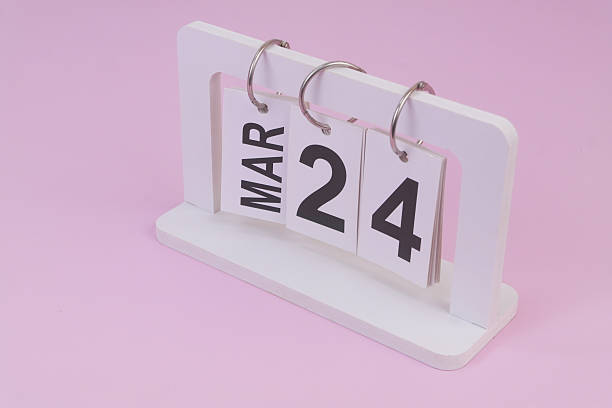 istock March 24 on calendar on pink background 2252911080
