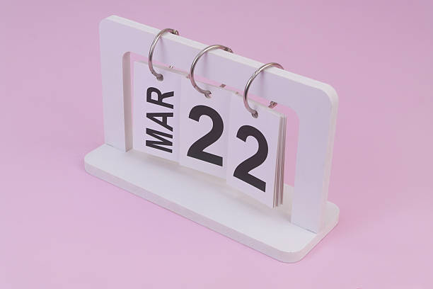 istock March 20 on calendar on pink background 2252911088