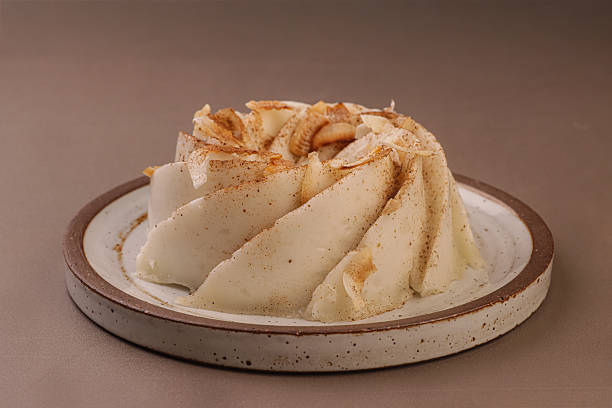 Tembleque is a traditional Puerto Rican coconut pudding known for its silky, gently jiggly texture, made with creamy coconut milk, cornstarch, sugar, and a pinch of salt, tembleque is cooked until thick, then chilled until set, finished with a dusting of ground cinnamon or toasted coconut flakes, especially served during the holidays and festive gatherings.