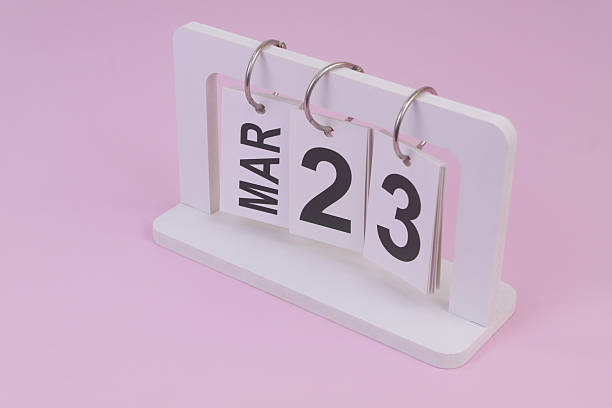 istock March 20 on calendar on pink background 2252911240