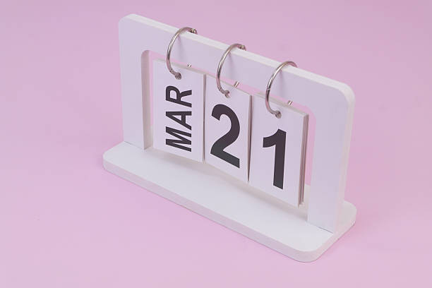 istock March 21 on calendar on pink background 2252911242