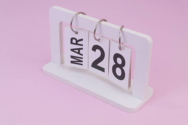 istock March 28 on calendar on pink background 2252911805