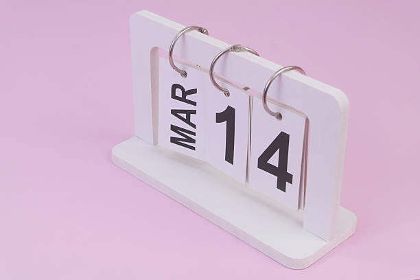 istock March 14 on calendar on pink background 2252911922