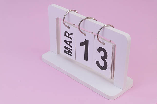 istock March 13 on calendar on pink background 2252911925