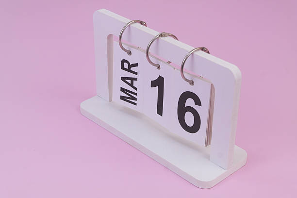 istock March 16 on calendar on pink background 2252911990