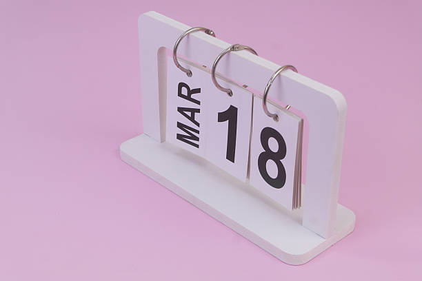 istock March 18 on calendar on pink background 2252912020