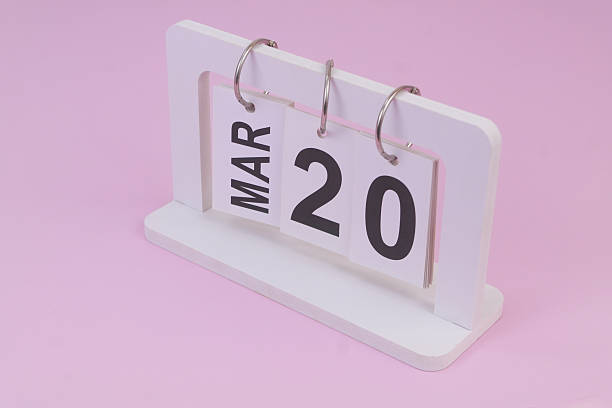 istock March 20 on calendar on pink background 2252912021