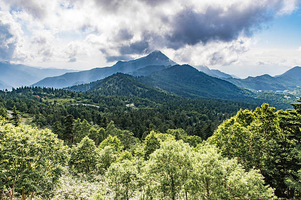 istock Lush Forested Mountains Beneath a Dramatic Sky, Nagano, Japan 2252912541