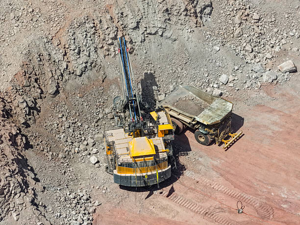 istock copper mineral extraction and loading process with heavy machinery in an open pit mine 2252913318