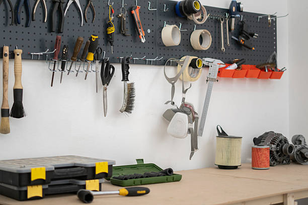 istock A well-organized workspace in a car service setting showcases various tools and equipment mounted on a pegboard, ideal for vehicle maintenance and repairs. 2252914767