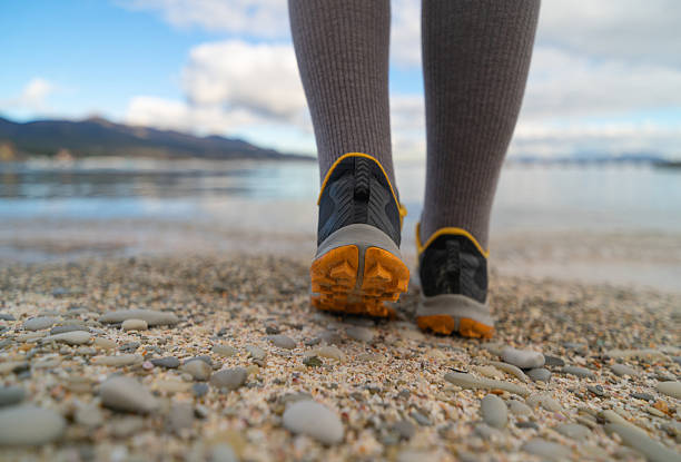 foot steps on seaside closeup