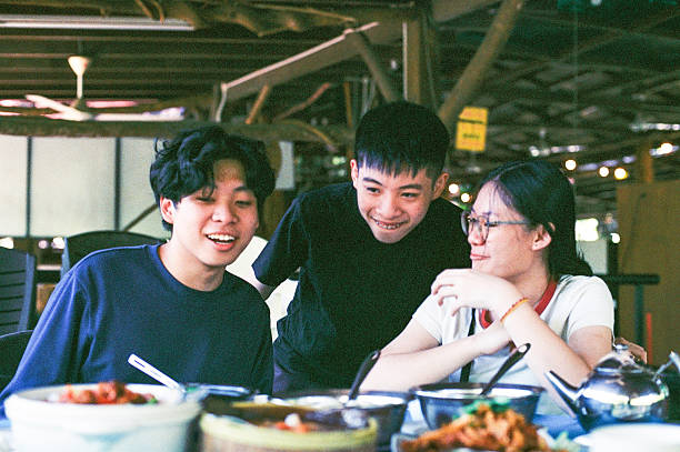istock Asian teenagers talking together 2252922868