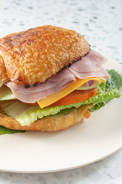 istock ham cheese croissant sandwich 2252924112