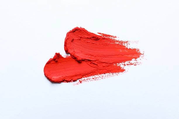 istock Smear of beautiful lipstick on white background, top view 2252925861