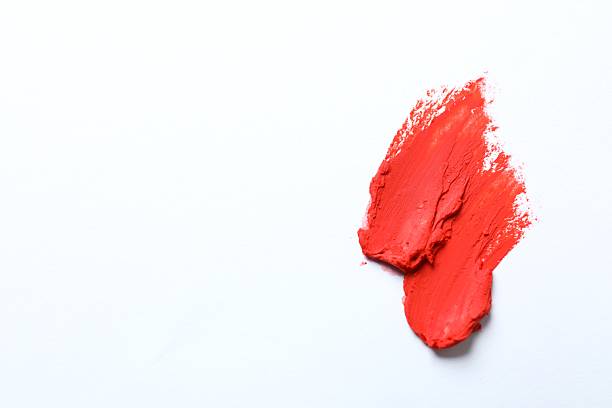 istock Smear of beautiful lipstick on white background, top view 2252925870