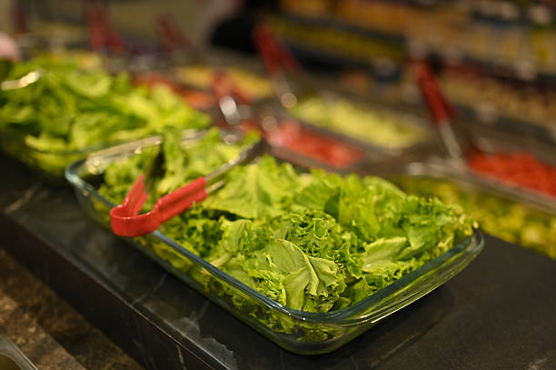 istock Sliced ​​green mustard greens on the table 2252926129