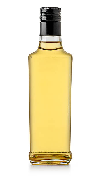 istock Glass bottle holding apple cider vinegar condiment 2252926781