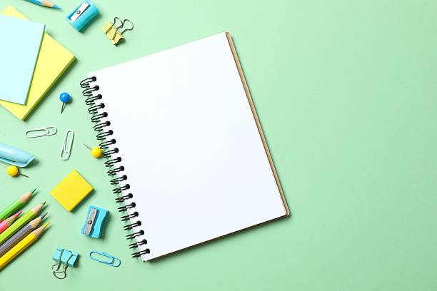 istock Flat lay with school stationery with notebook on color background, top view 2252927299