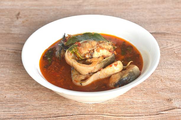 istock spicy chili boiled catfish with eggplant and basil in curry soup 2252927840