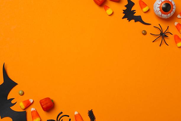 istock Different Halloween decorations including pumpkins, spiders, bats on color background 2252928333