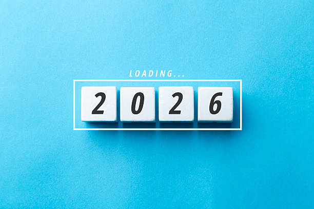 istock Loading 2026 concept with white blocks on a blue background. Minimalist flat lay symbolizing future planning, business goals, and the arrival of the new year with progress and change 2252928753