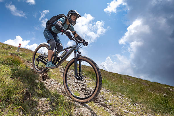istock Female mountain biker downhill. 2252934036