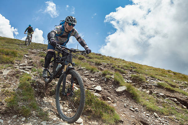 istock Two male mountain bikers on downhill. 2252934326