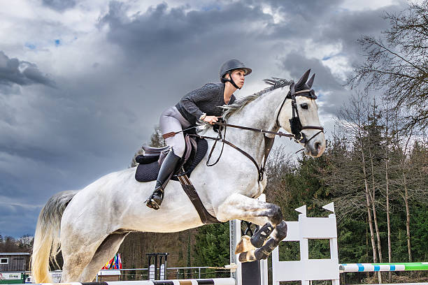 istock Show Jumping on stormy conditions. 2252936635