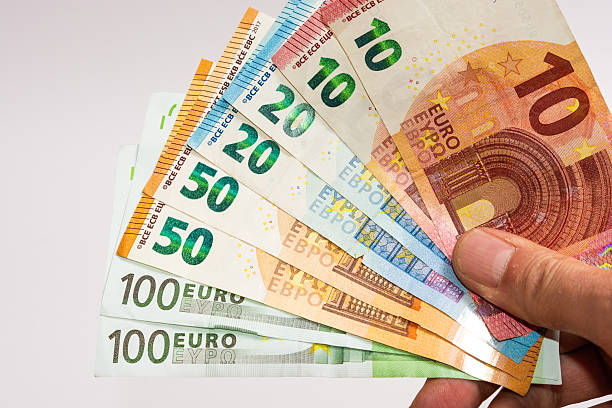 istock Abstract and conceptual of Banknotes in hand on white background. 2252939717