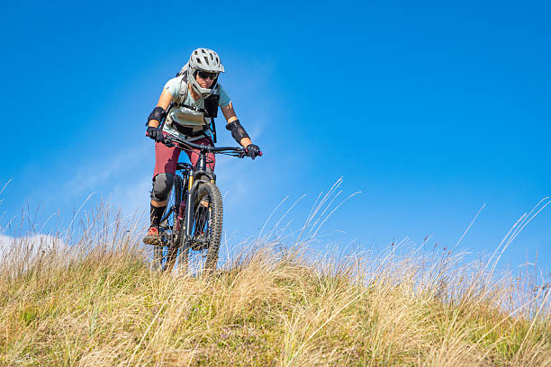istock Female mountain biker on the ride. 2252940302
