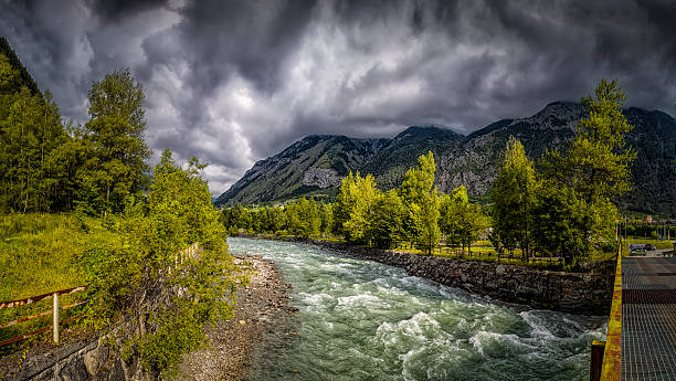 Fiume Dora Baltea (river) flowing through Aosta valley mountains