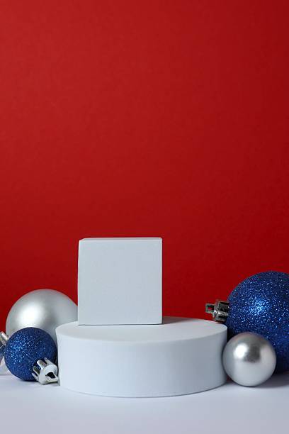 istock Beautiful composition with podium and Christmas decor on two-tone background 2252944499