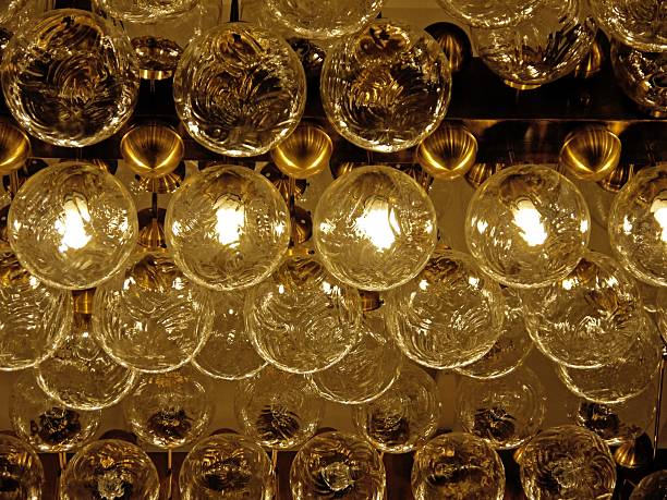 istock Lot of bulbs organized in rows on ceiling 2252946281