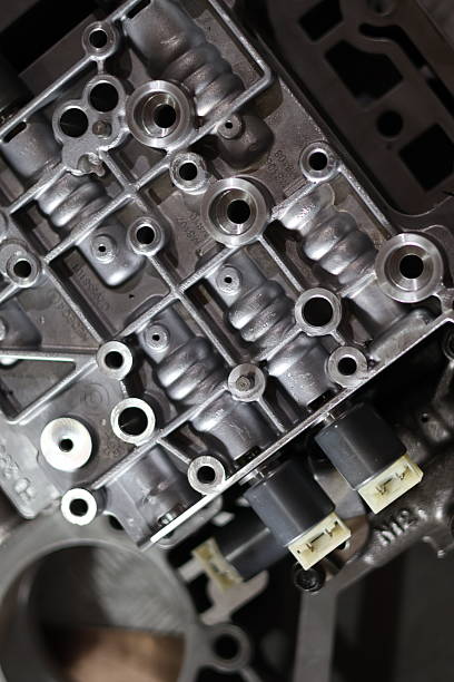 istock Top view of a silver metallic automatic transmission valve body unit. 2252950906