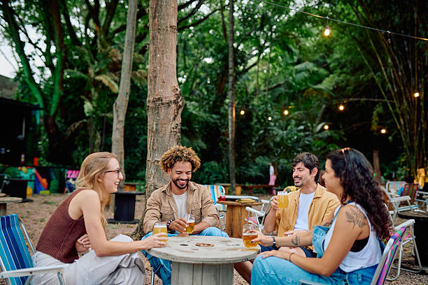 istock Diverse friends enjoying drinks outdoor at a casual gathering 2252951238