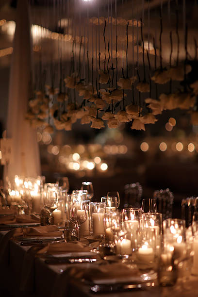 istock Romantic Candlelit Wedding Table with Hanging White Roses. stock photo 2252953334