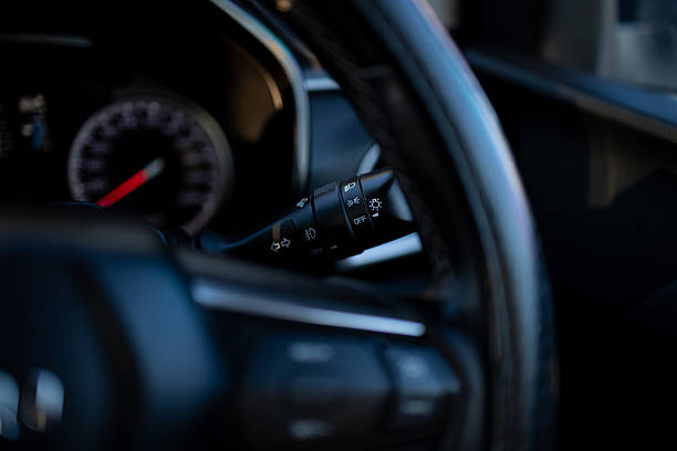 istock Nearby headlight switch,Turn signal lever, adjusting car headlight control switch. 2252959941