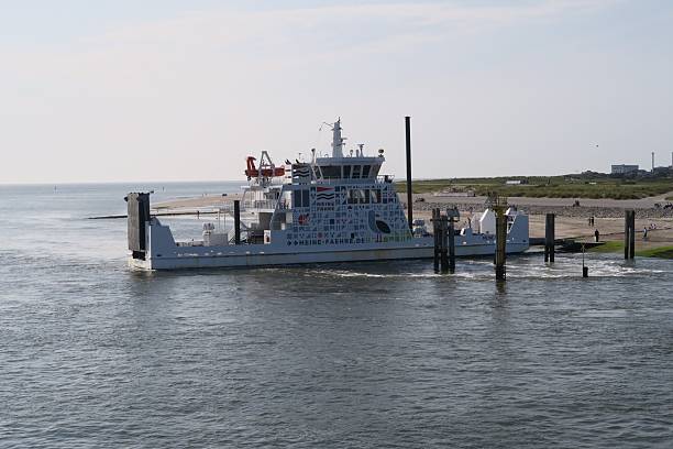 Norderney, Lower Saxony, Germany - August 12, 2025: The ferry Meine Faehre 1 has arrived at its pier on the German North Sea island Norderney. Meine Faehre is a new connection from the island to Norddeich.