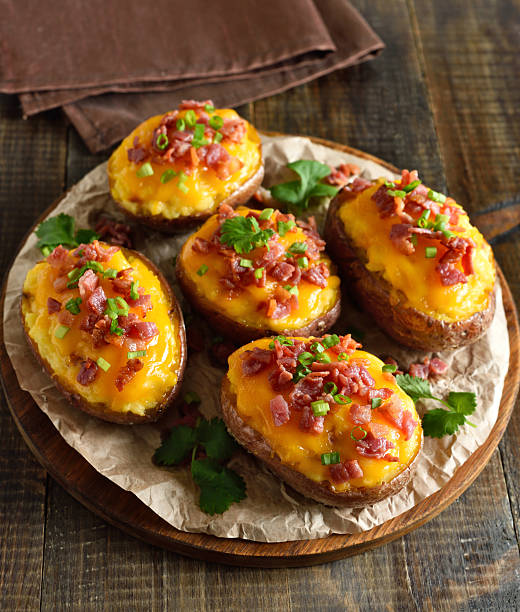 istock Baked stuffed potatoes with bacon, green onion and cheddar cheese 2252968006