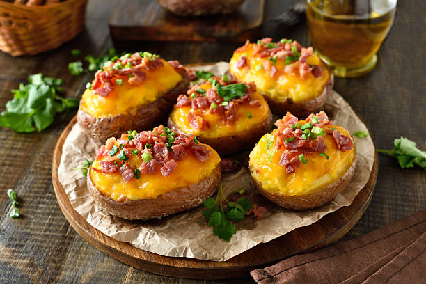 istock Baked stuffed potatoes with bacon, green onion and cheddar cheese 2252968008