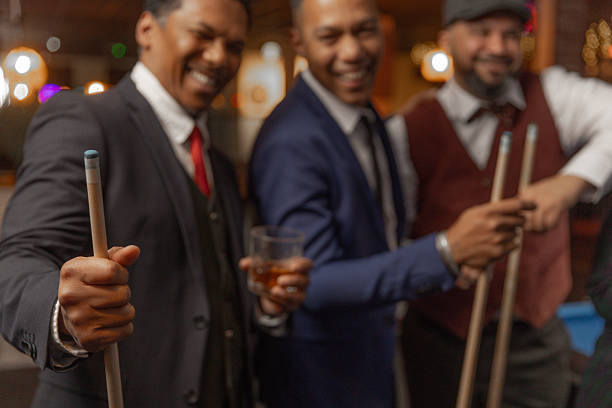 Black men friends at a pool hall